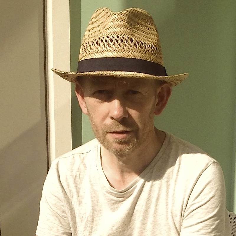 Author photograph of British novelist and short story writer Derek Thompson.