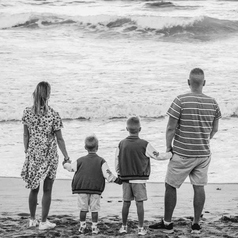 Family Photograph - Family members looking out to the sea